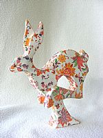 Floral running hare decoupage hare sculpture by Artist Suzie Emery